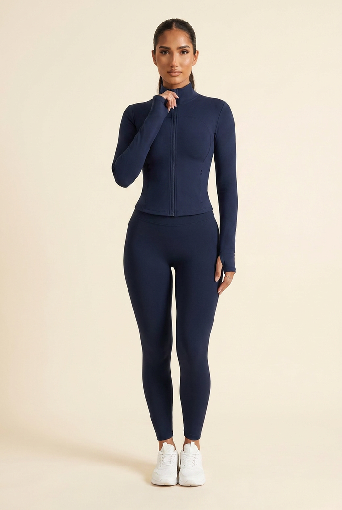 Kovelle zip through gym jacket in navy, on model