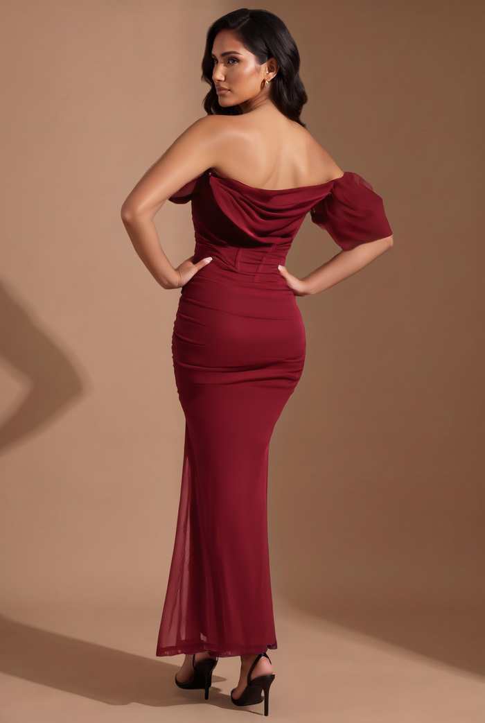Kovelle off-shoulder corset maxi dress in burgundy, back view on model