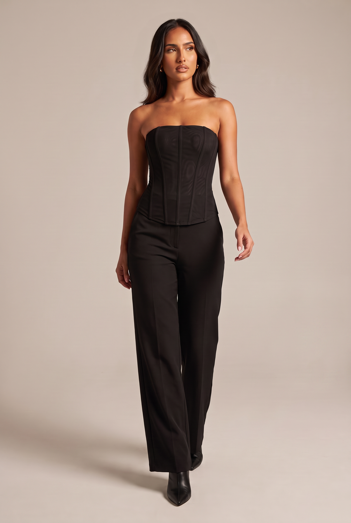Kovelle strapless mesh bustier in black, walking, full length on model