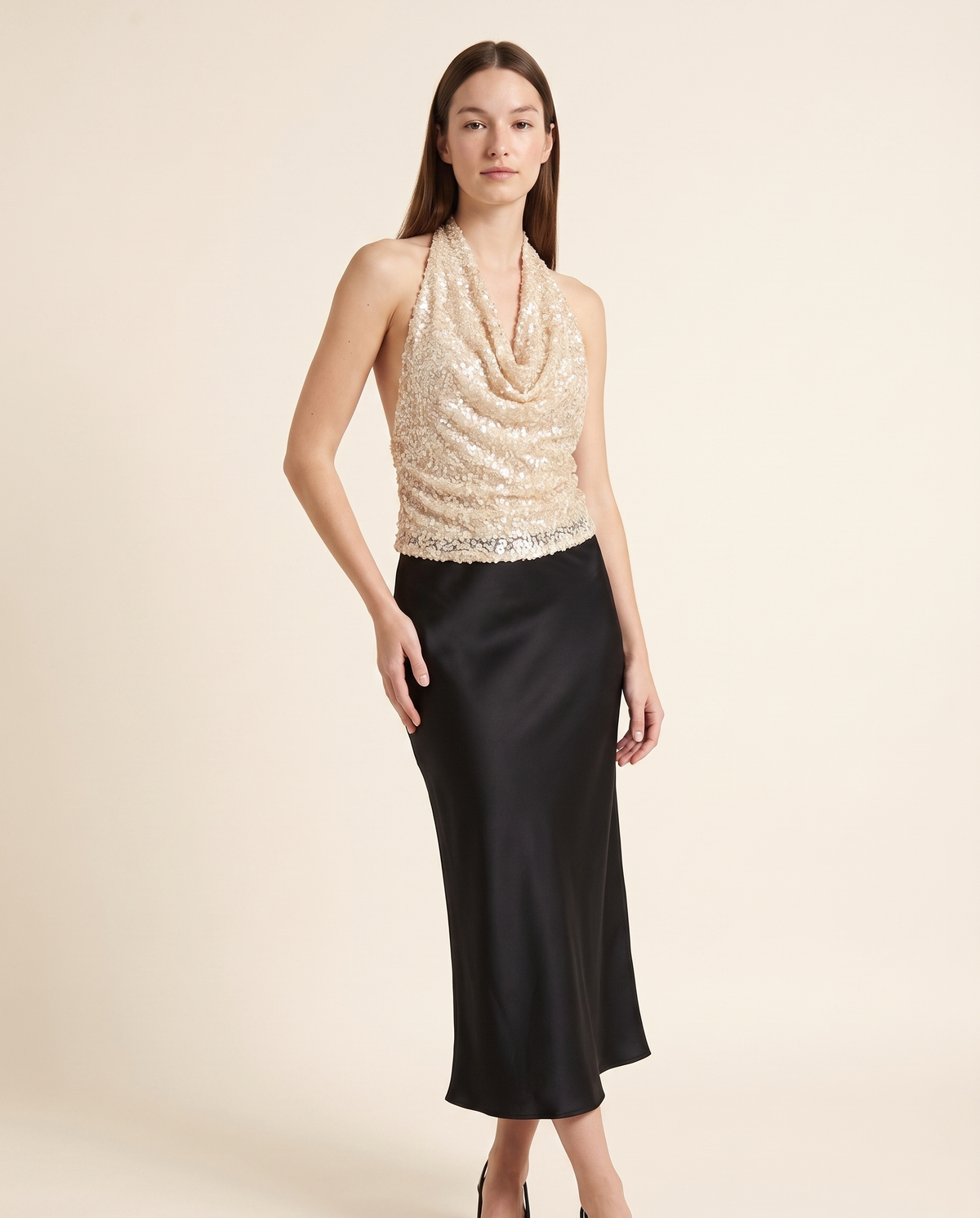 Kovelle sequin cowl halter top three quarter view, on model
