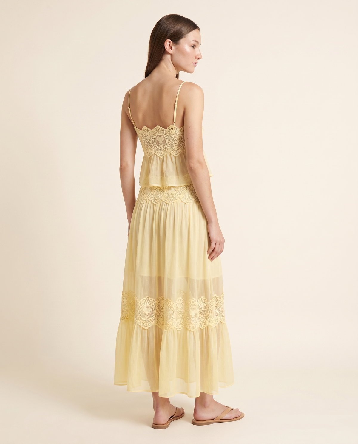 Kovelle yellow lace set back view, on model