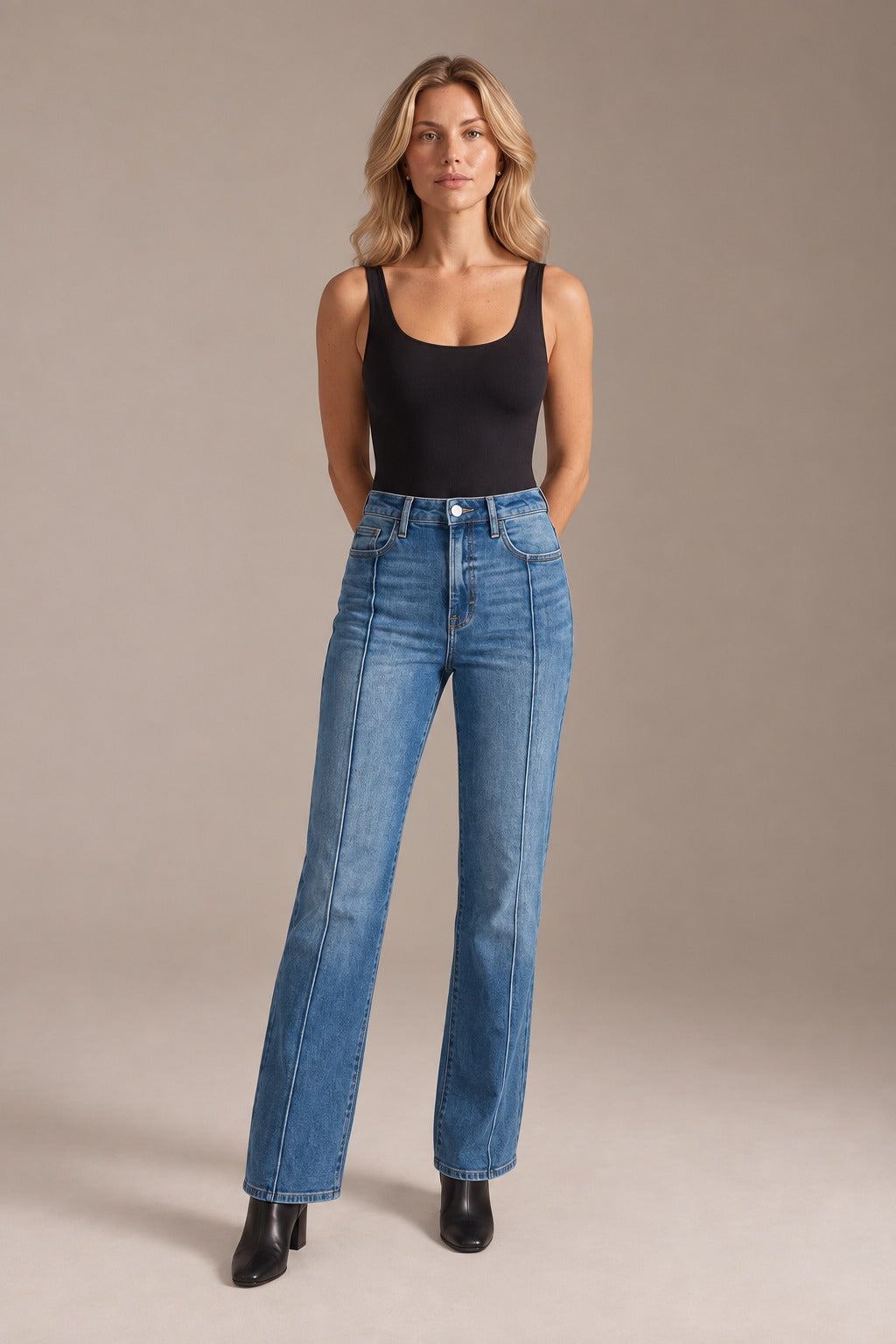 Kovelle mid-rise straight leg jeans in mid blue, front view on model