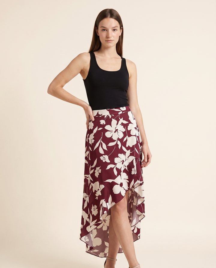 Kovelle floral asymmetric midi skirt three quarter view, on model