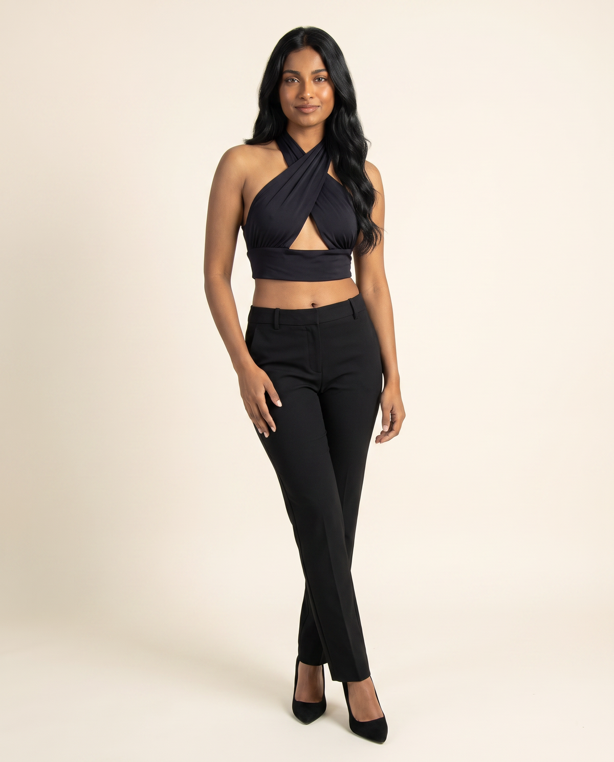 Kovelle black cut out halter top three quarter view, on model