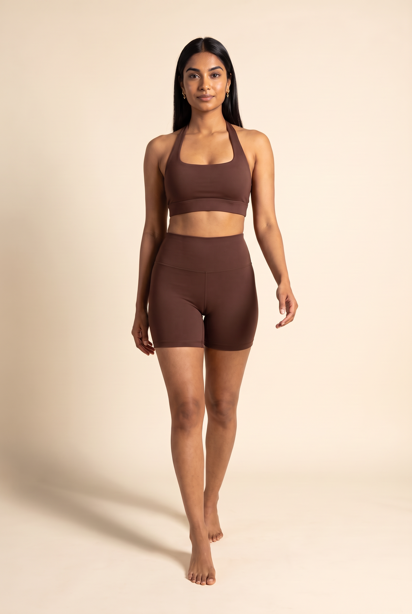 Kovelle seamless halter gym set in chocolate, walking, full length on model