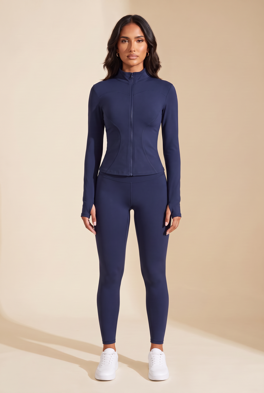 Kovelle zip-through gym jacket in navy, front view on model