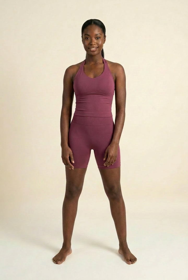 Kovelle halter vest gym set in winter berry, vest and fitted shorts, front on model