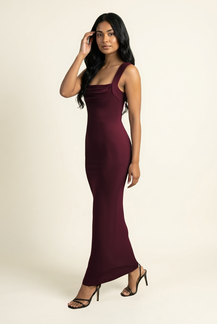 Kovelle square neck bodycon maxi dress in burgundy, walking pose, on model