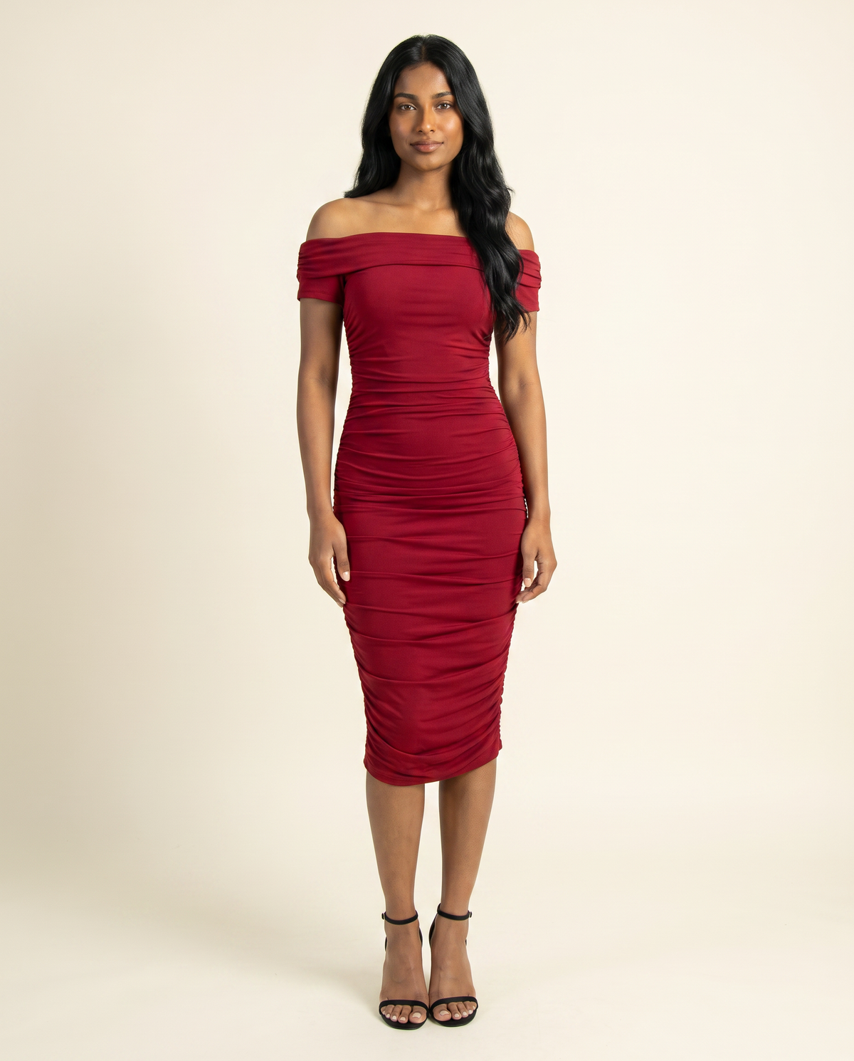 Kovelle red ruched off shoulder midi, front studio view on model