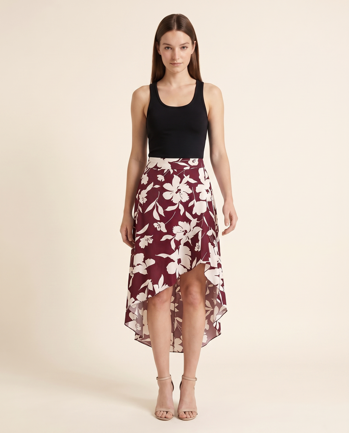 Kovelle burgundy floral ruffle midi skirt, front studio view on model
