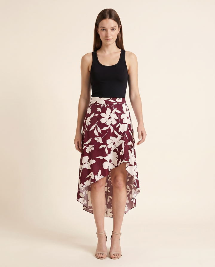 Kovelle burgundy floral ruffle midi skirt, front studio view on model