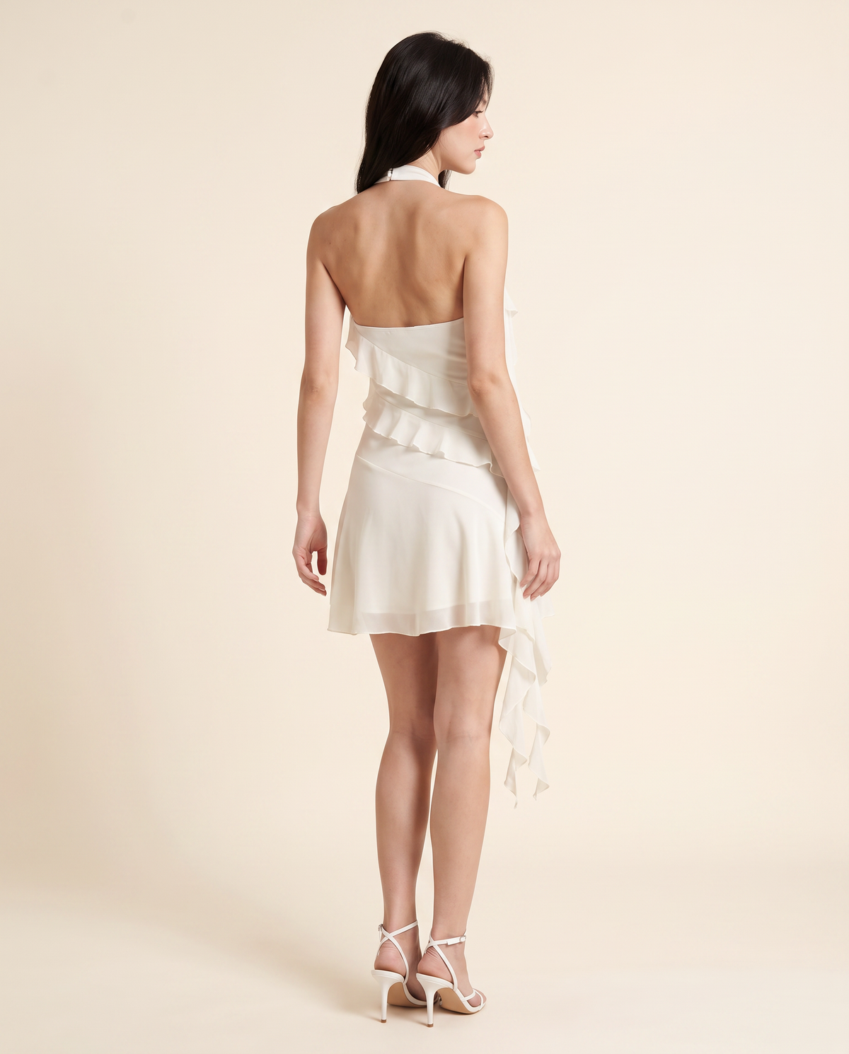 Kovelle white chiffon mini dress back view, on model