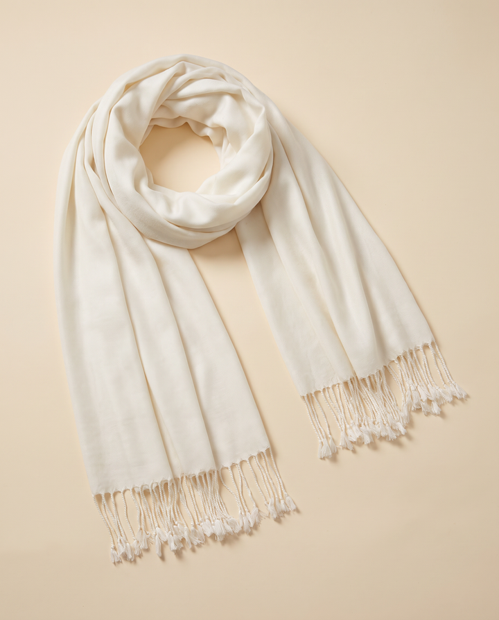 Ivory pashmina shawl loosely folded, angled