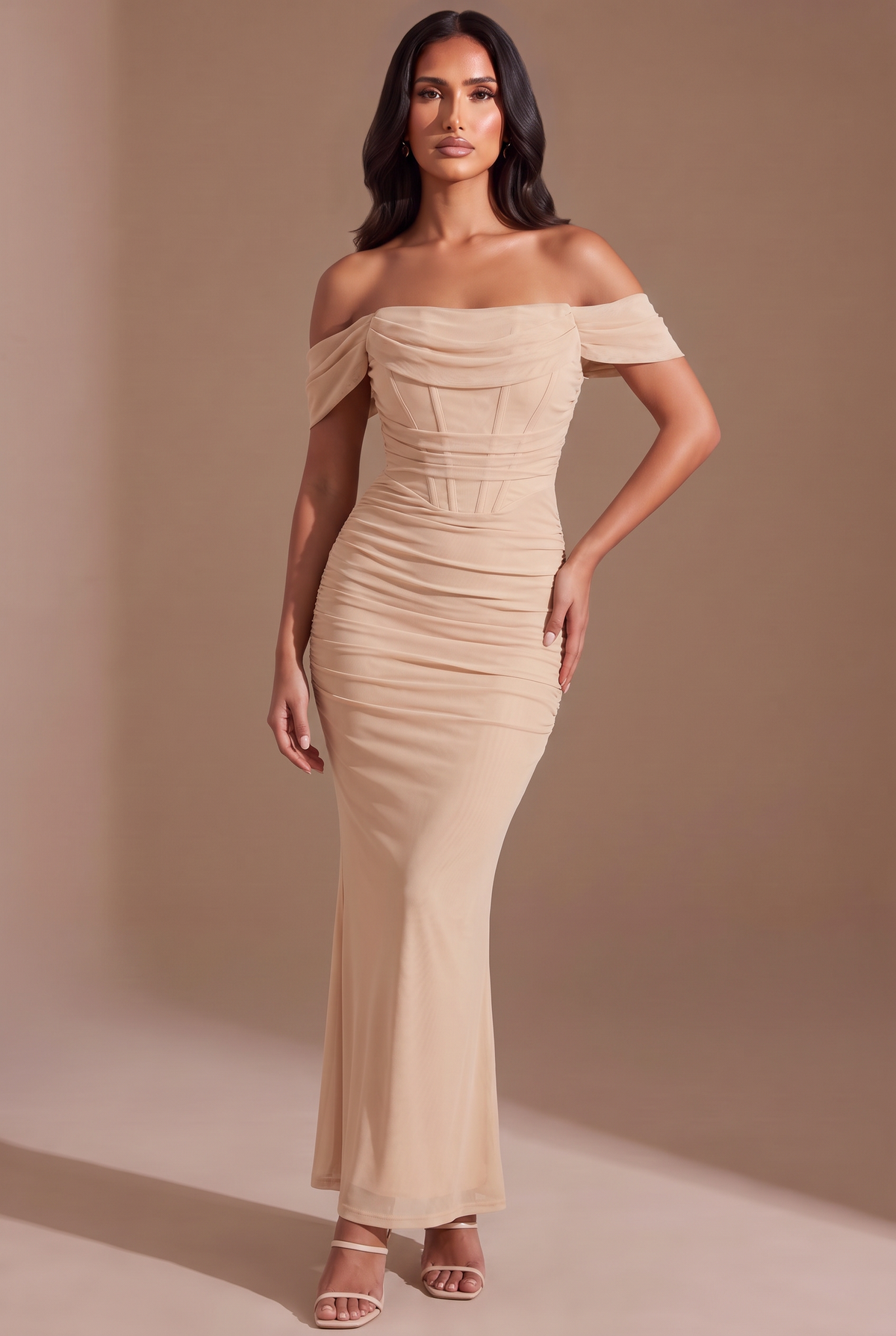 Kovelle off-shoulder corset maxi dress in nude, front view on model