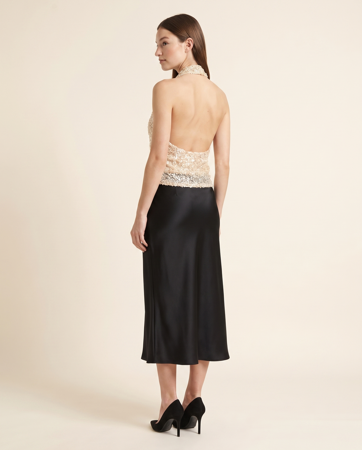 Kovelle champagne sequin top back view showing open back, on model