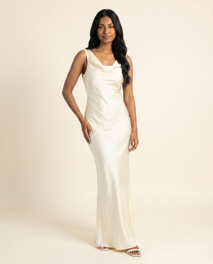 Kovelle ivory draped satin maxi three quarter view, on model