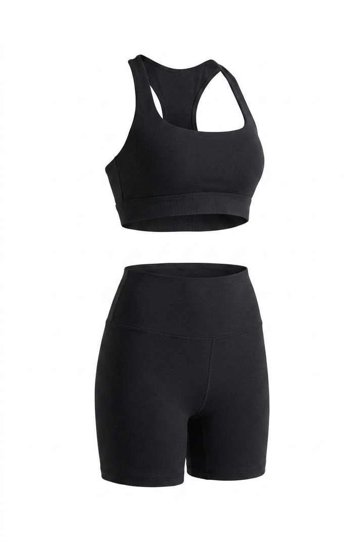 The Kovelle Seamless Halter Gym Set in black photographed on its own against a white background, showing the halter bra and matching shorts