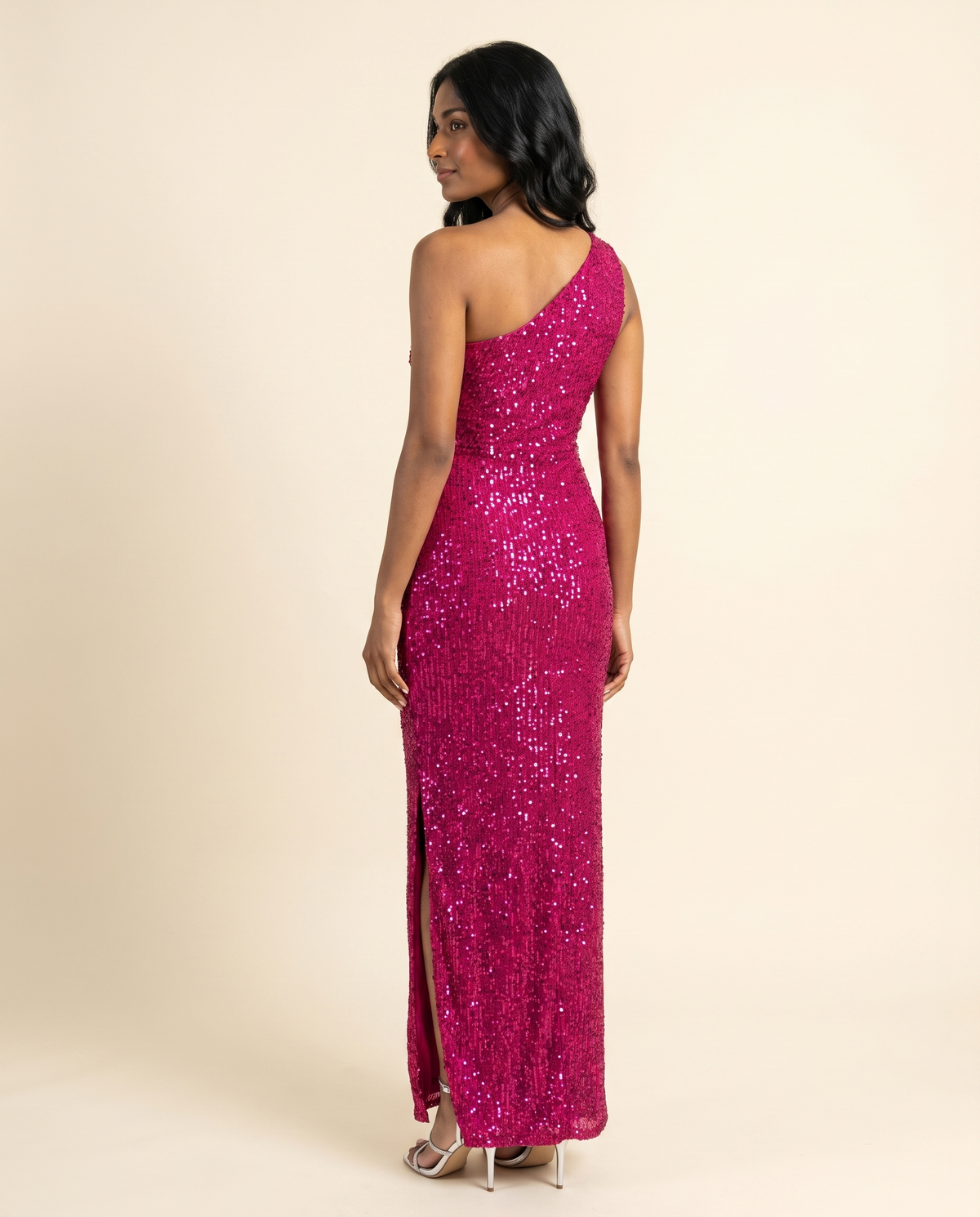 Kovelle pink sequin one shoulder gown back view, on model