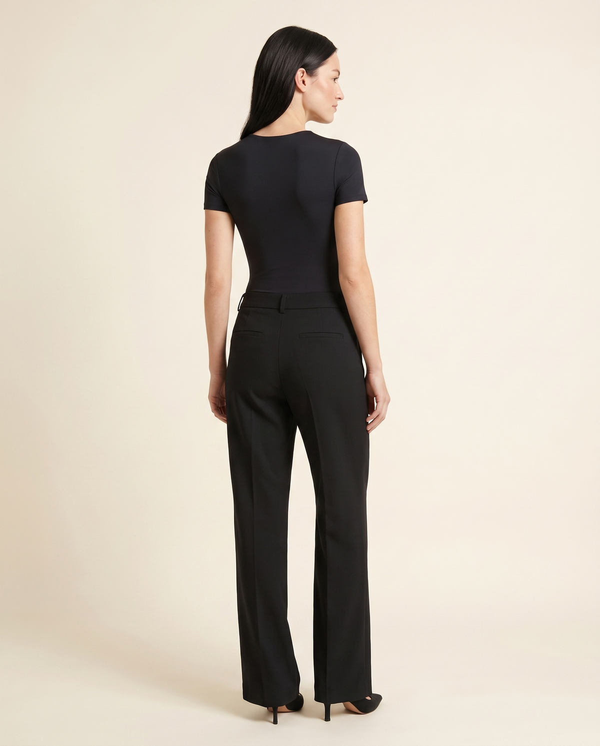 Kovelle black sculpt bodysuit back view, on model