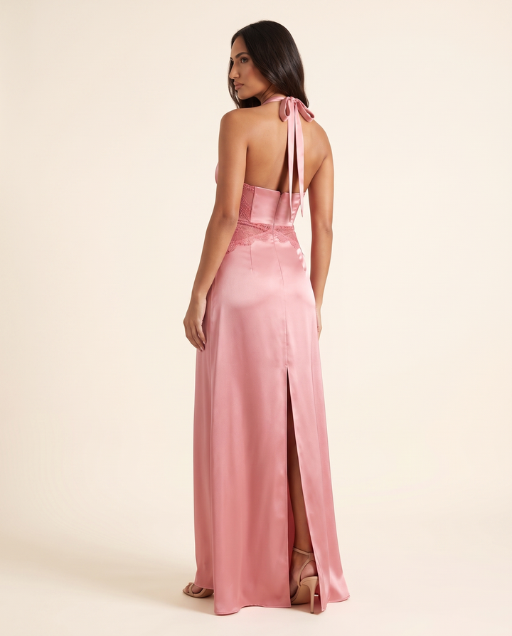 Kovelle blush satin maxi back view showing halter ties, on model