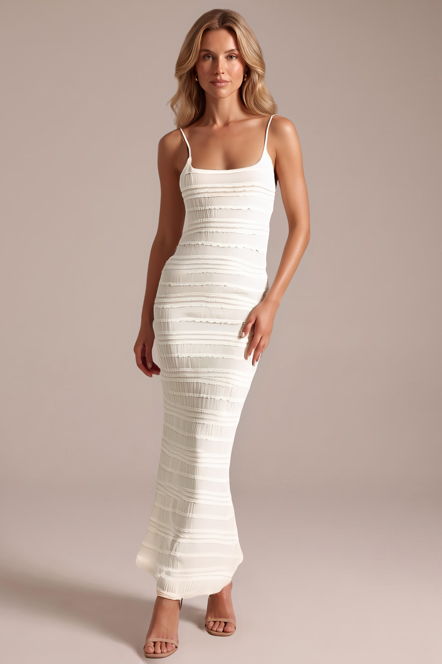 Model wearing the coconut ribbed knit maxi dress, front view