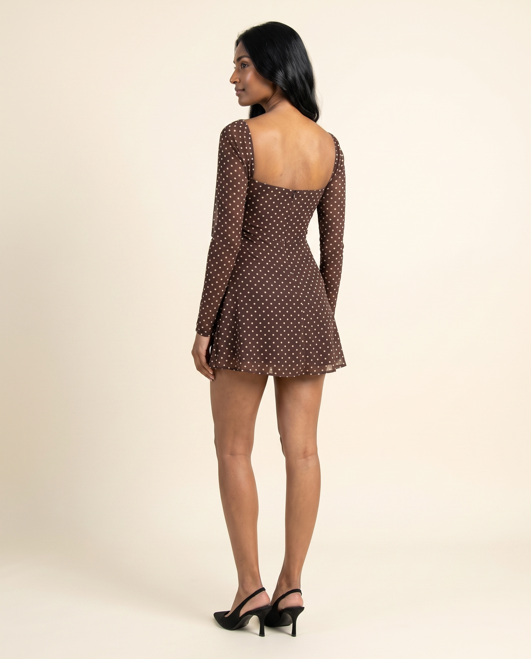 Kovelle brown dot long sleeve mini back view, on model