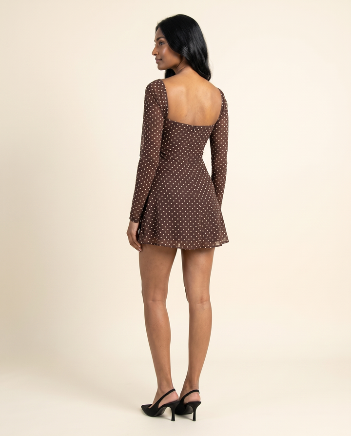 Kovelle brown dot long sleeve mini back view, on model