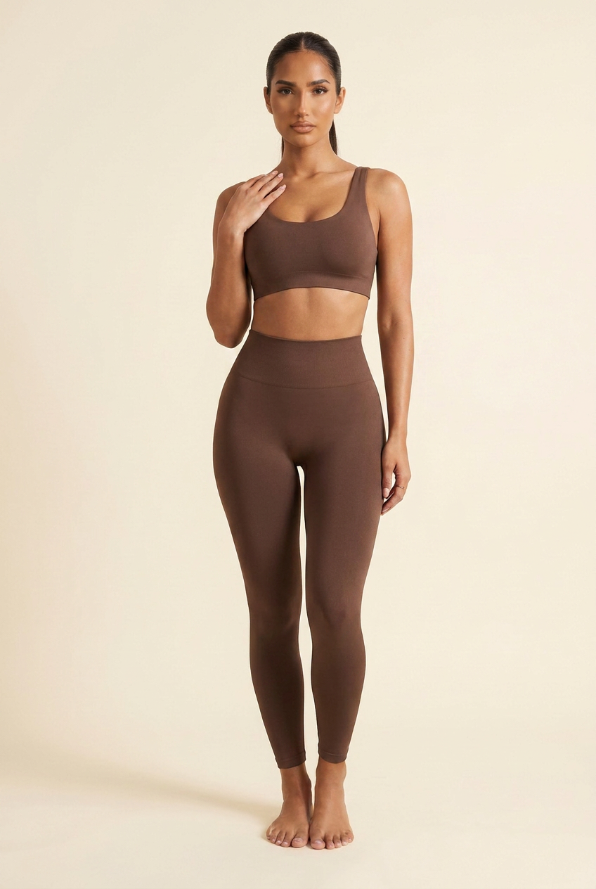 Kovelle sculpt seamless leggings in coffee, hand resting on her shoulder, front view on model