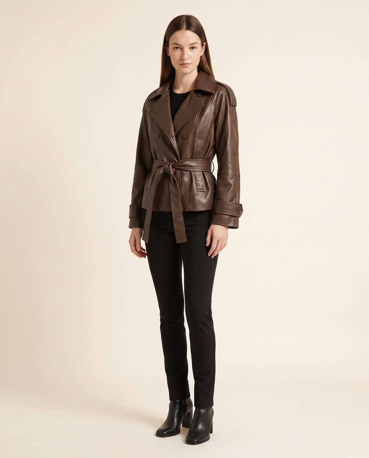 Kovelle brown faux leather trench three quarter view, on model
