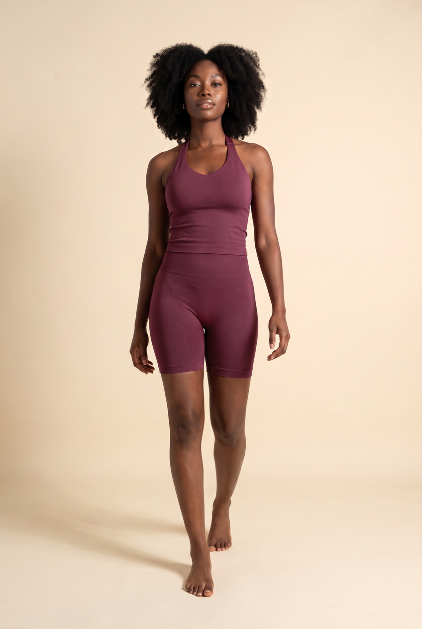 Kovelle halter vest gym set in winter berry, walking, full length on model