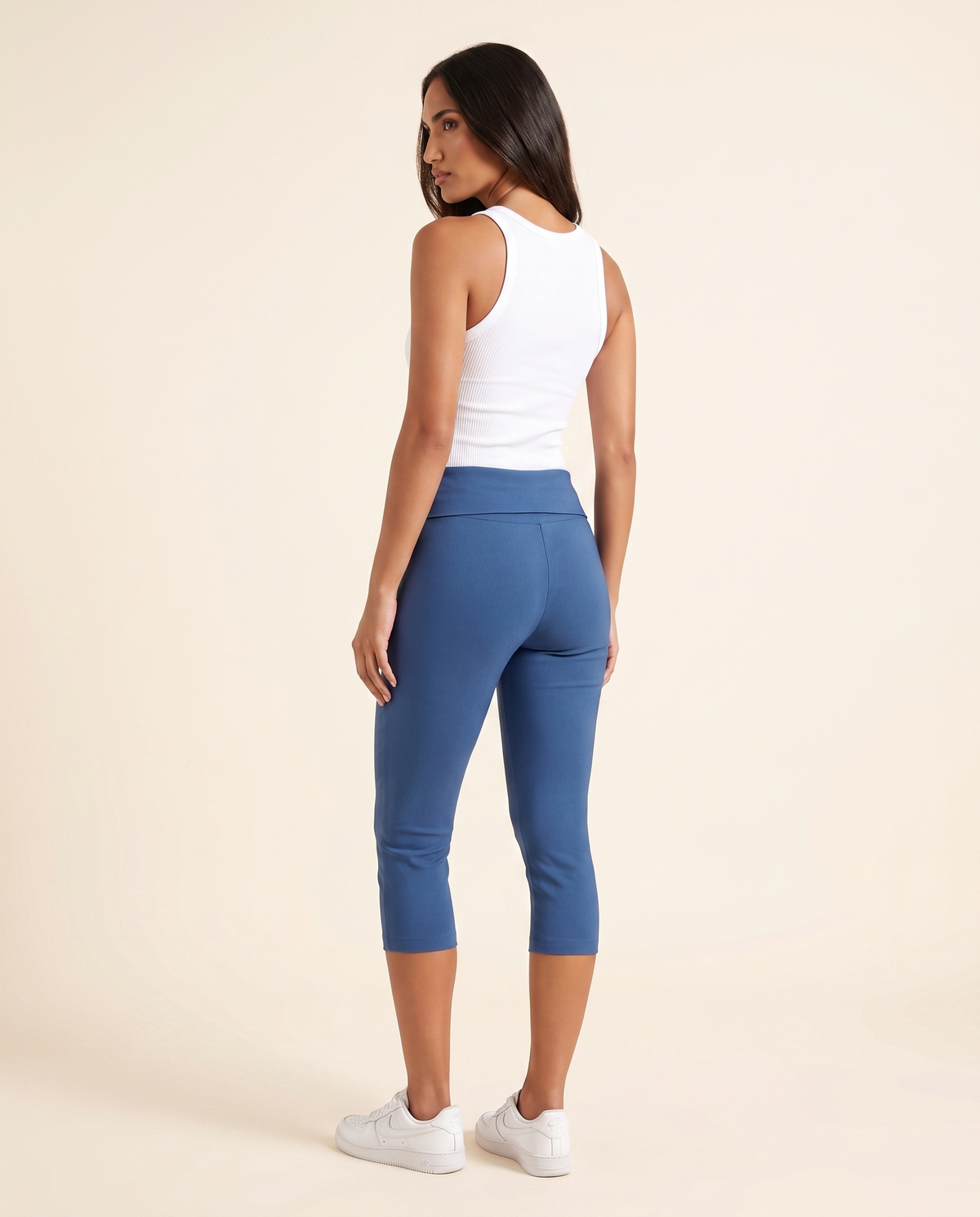 Kovelle blue capri trousers back view, on model