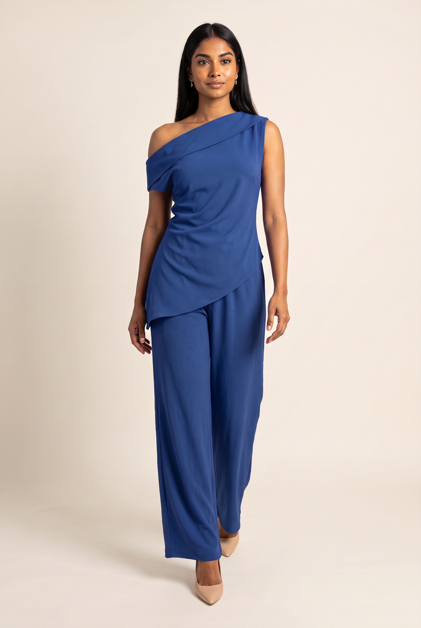 Kovelle asymmetric draped trouser set in cobalt, walking, full length on model