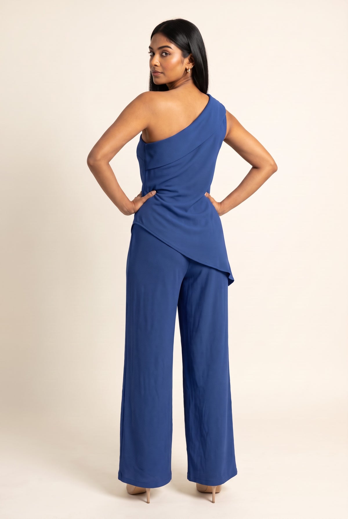 Kovelle asymmetric draped trouser set in cobalt, back view on model