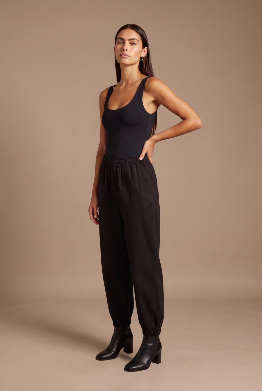 Kovelle balloon wide leg trousers in black, front view on model