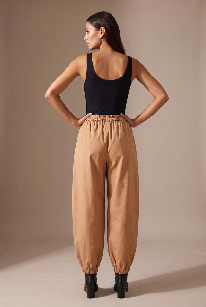 Kovelle balloon wide leg trousers in camel, back view on model
