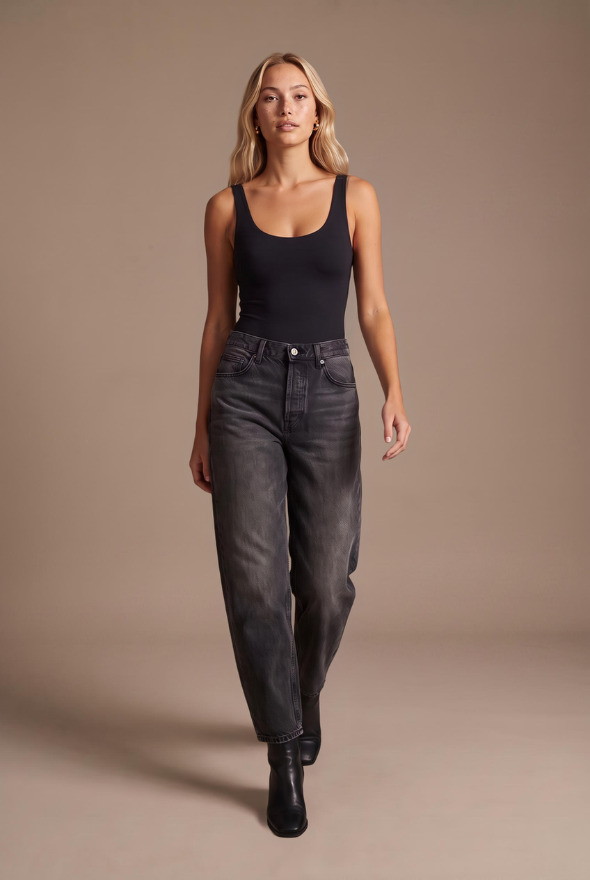 Kovelle barrel leg jeans in washed black, walking, full length on model