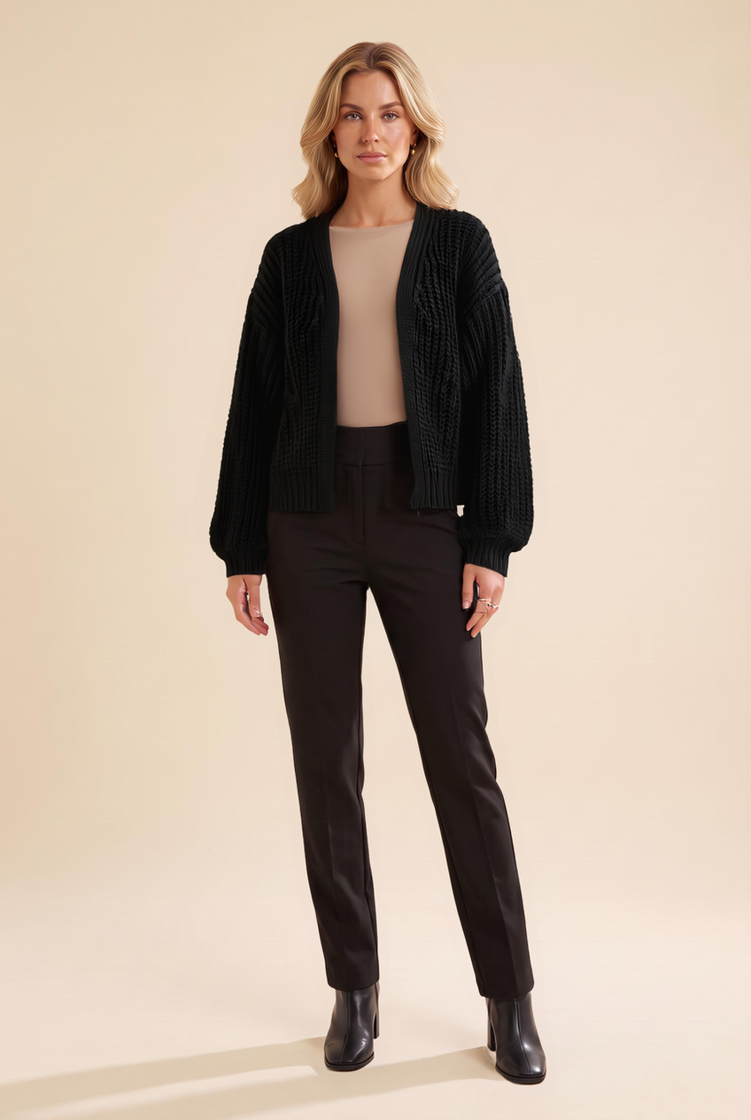 Kovelle chunky knit cardigan in black, front view on model