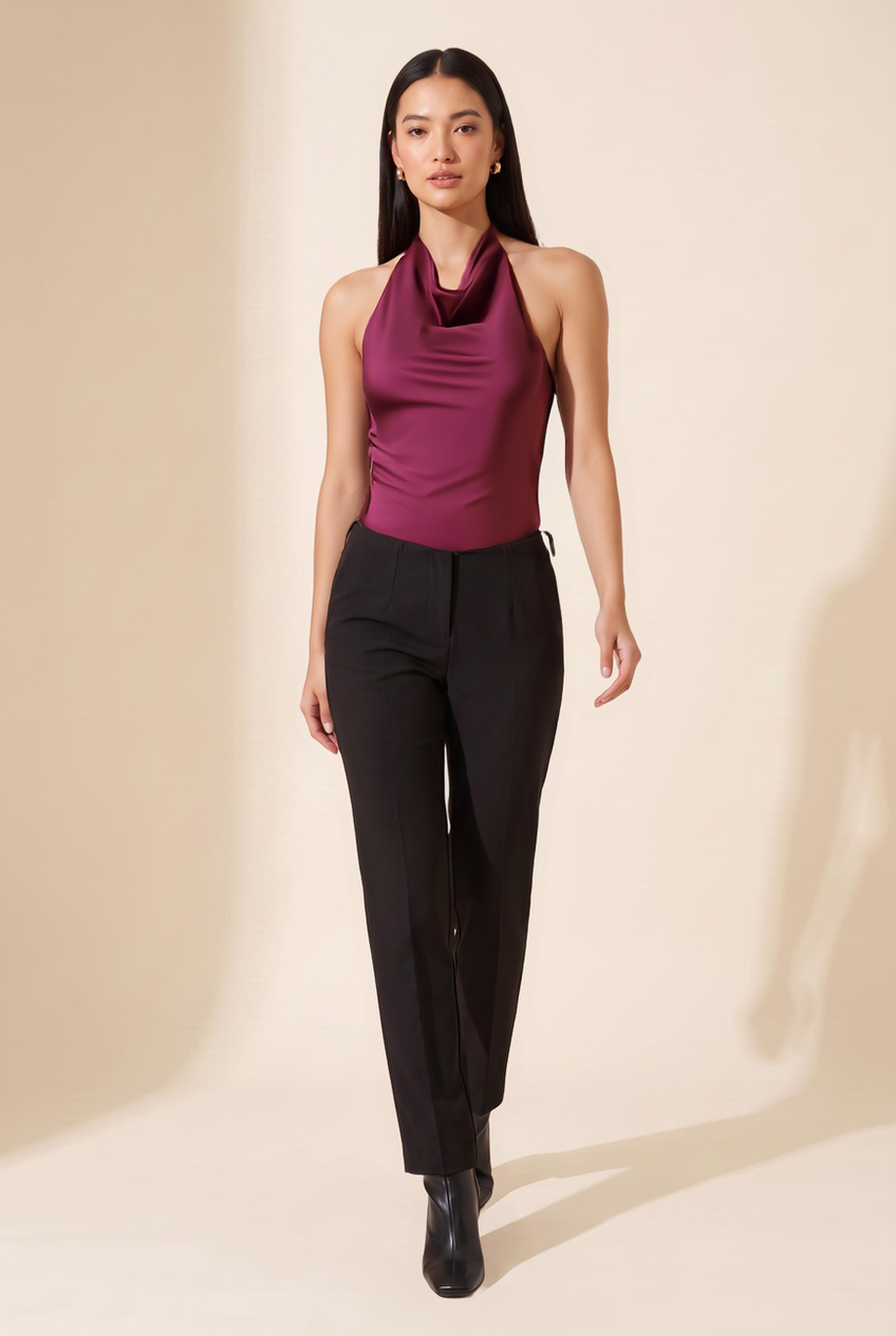 Kovelle cowl halter satin top in maroon, walking, full length on model