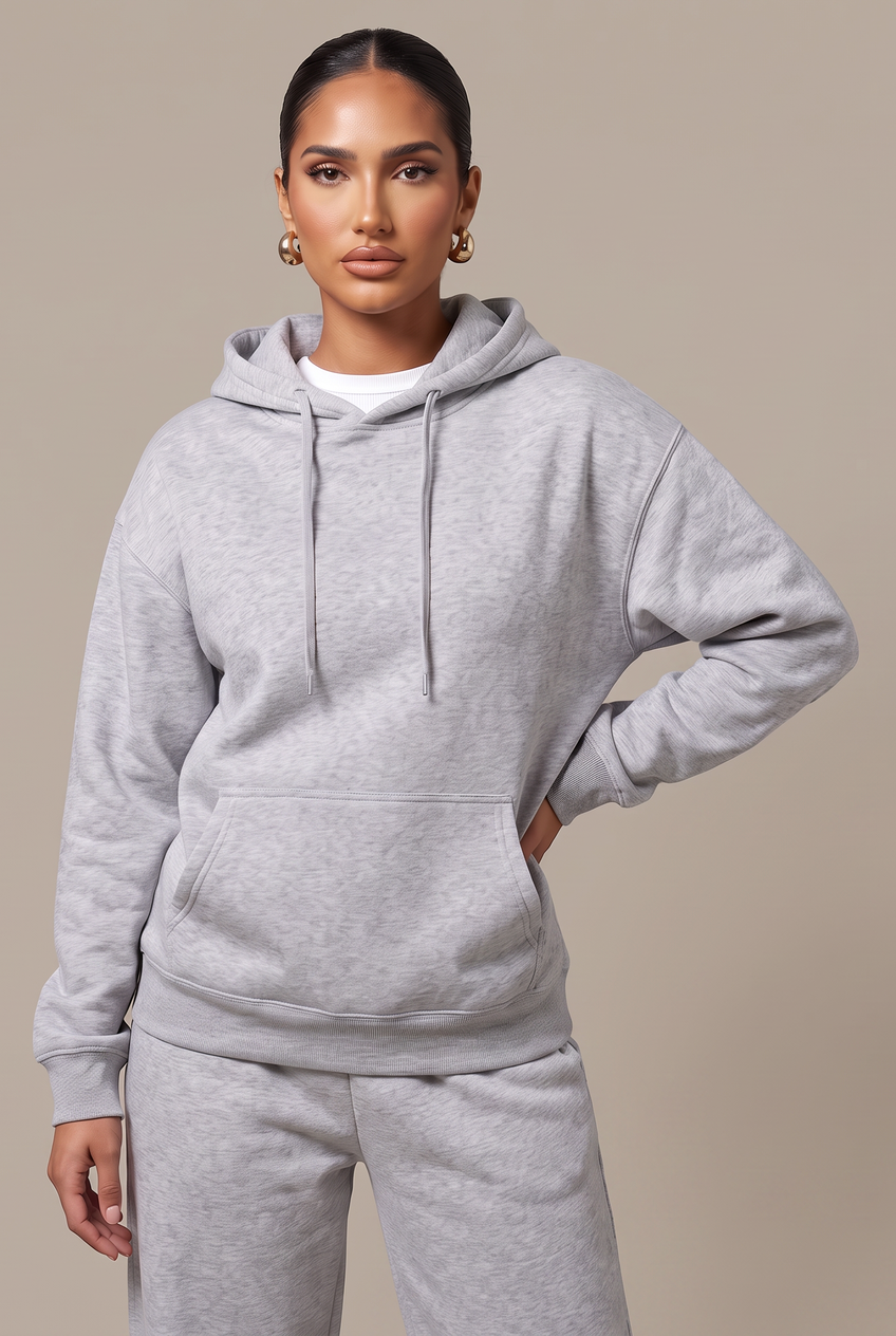 Kovelle everyday pullover hoodie in grey, three-quarter view on model