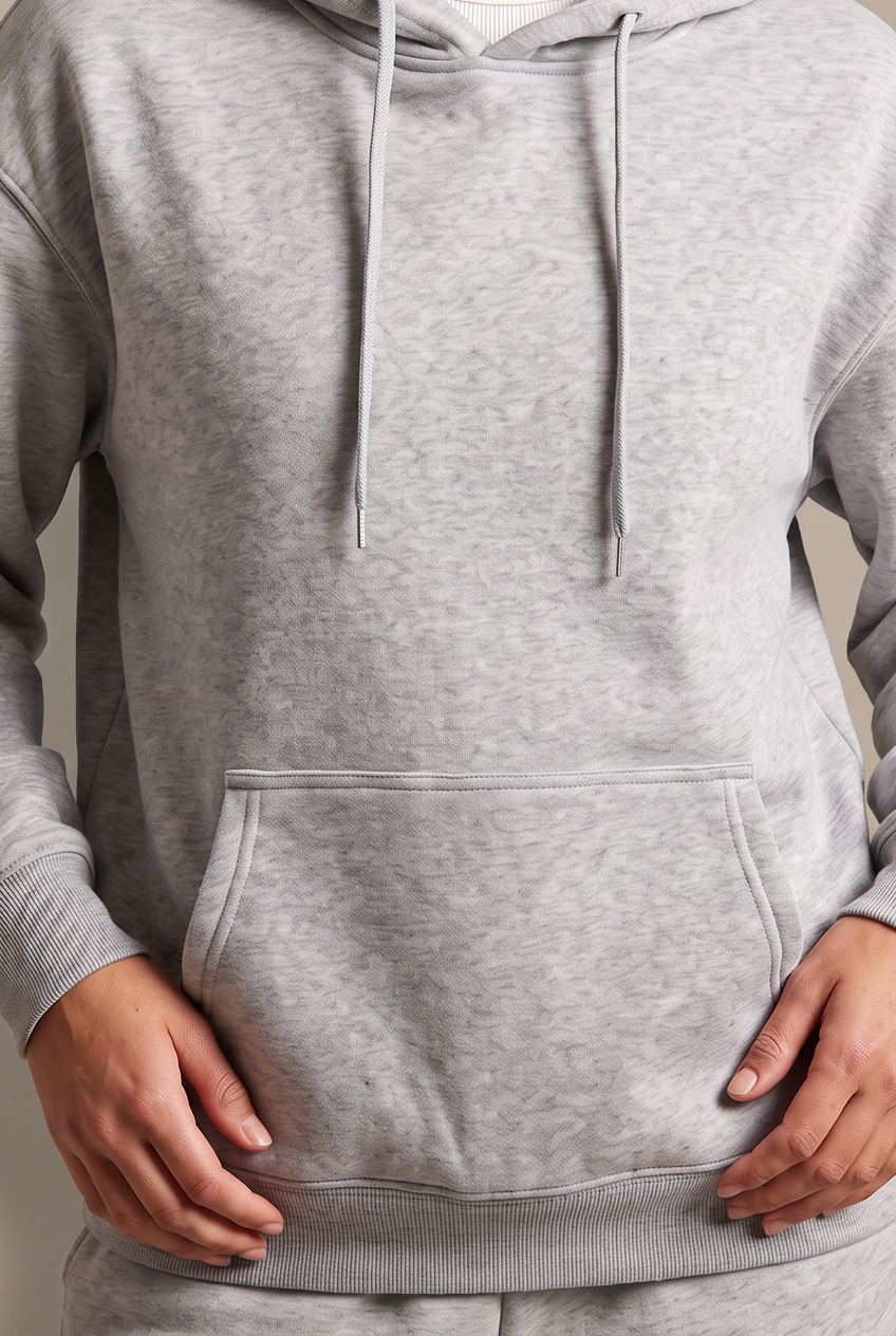 Kovelle everyday pullover hoodie in grey, close-up detail on model