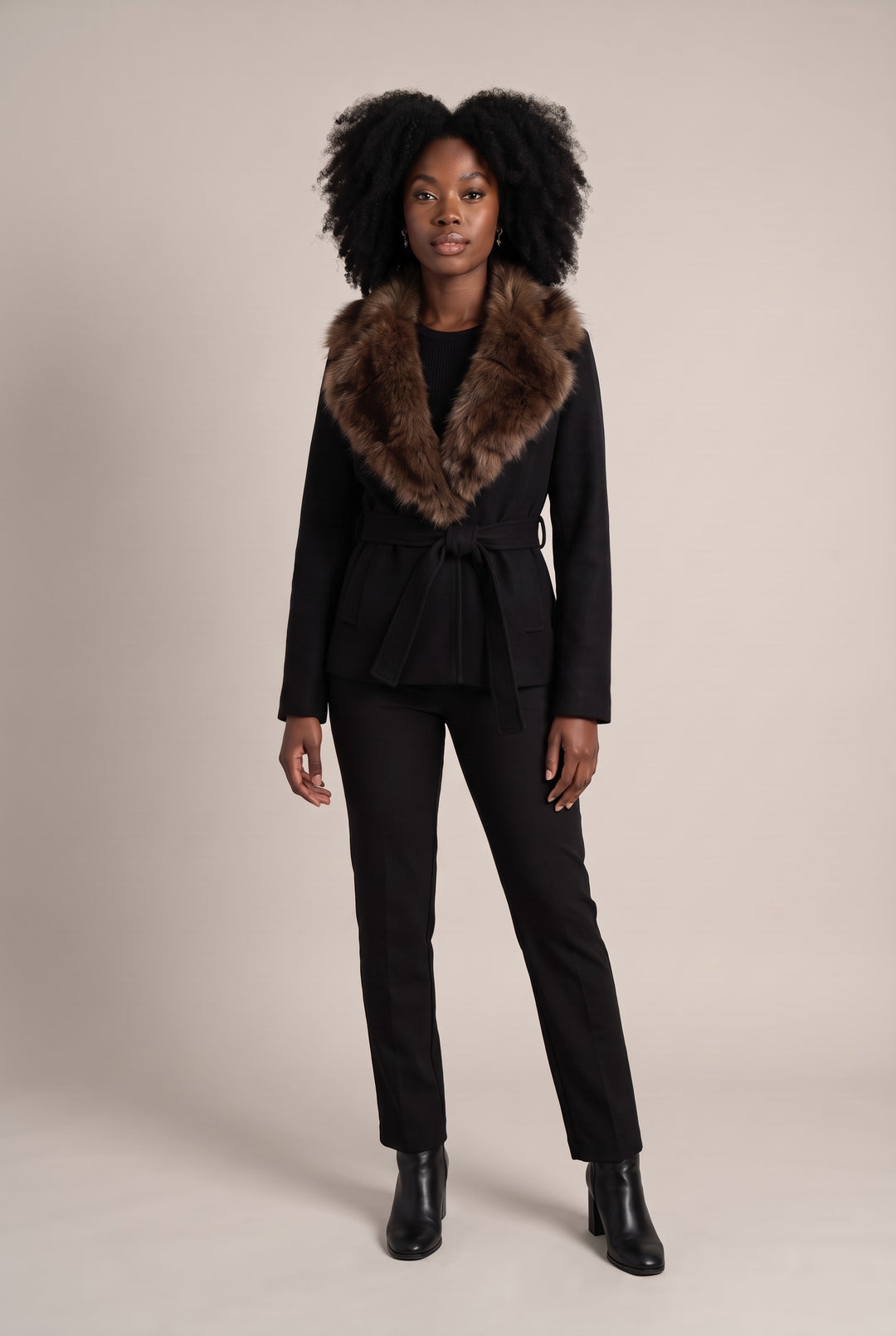 Kovelle faux fur collar belted coat in black, front view on model