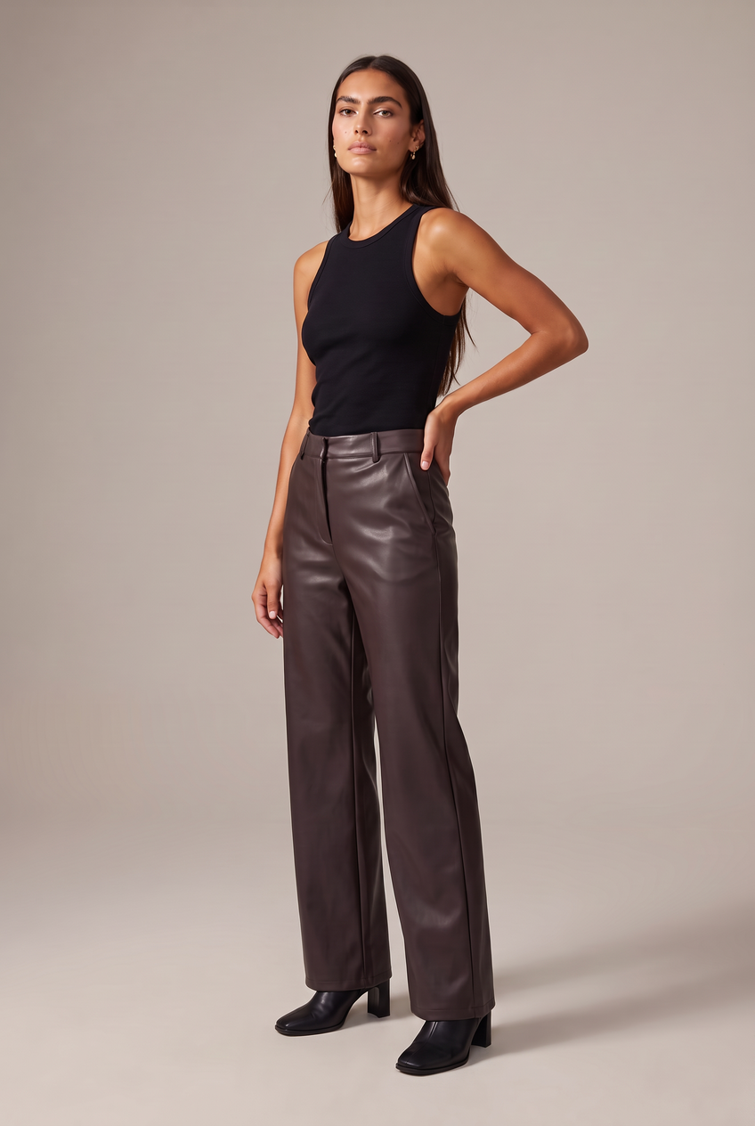 Kovelle faux leather wide leg trousers in chocolate, front view on model