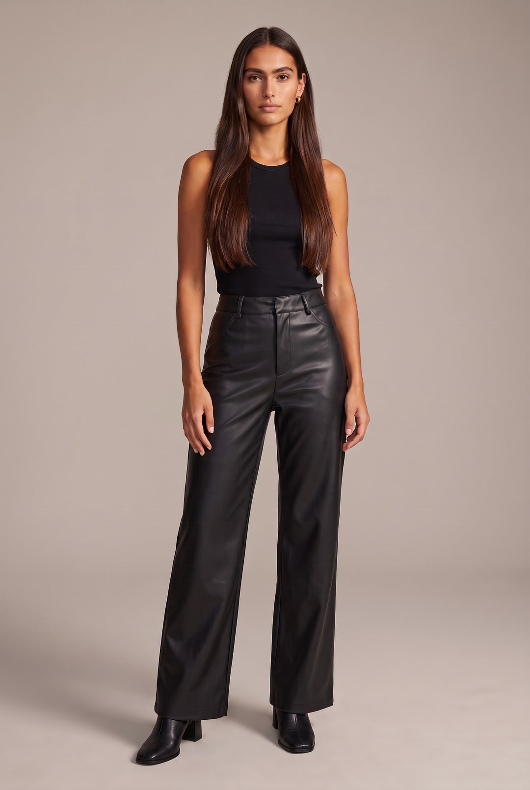 Kovelle faux leather wide leg trousers in black, front view on model