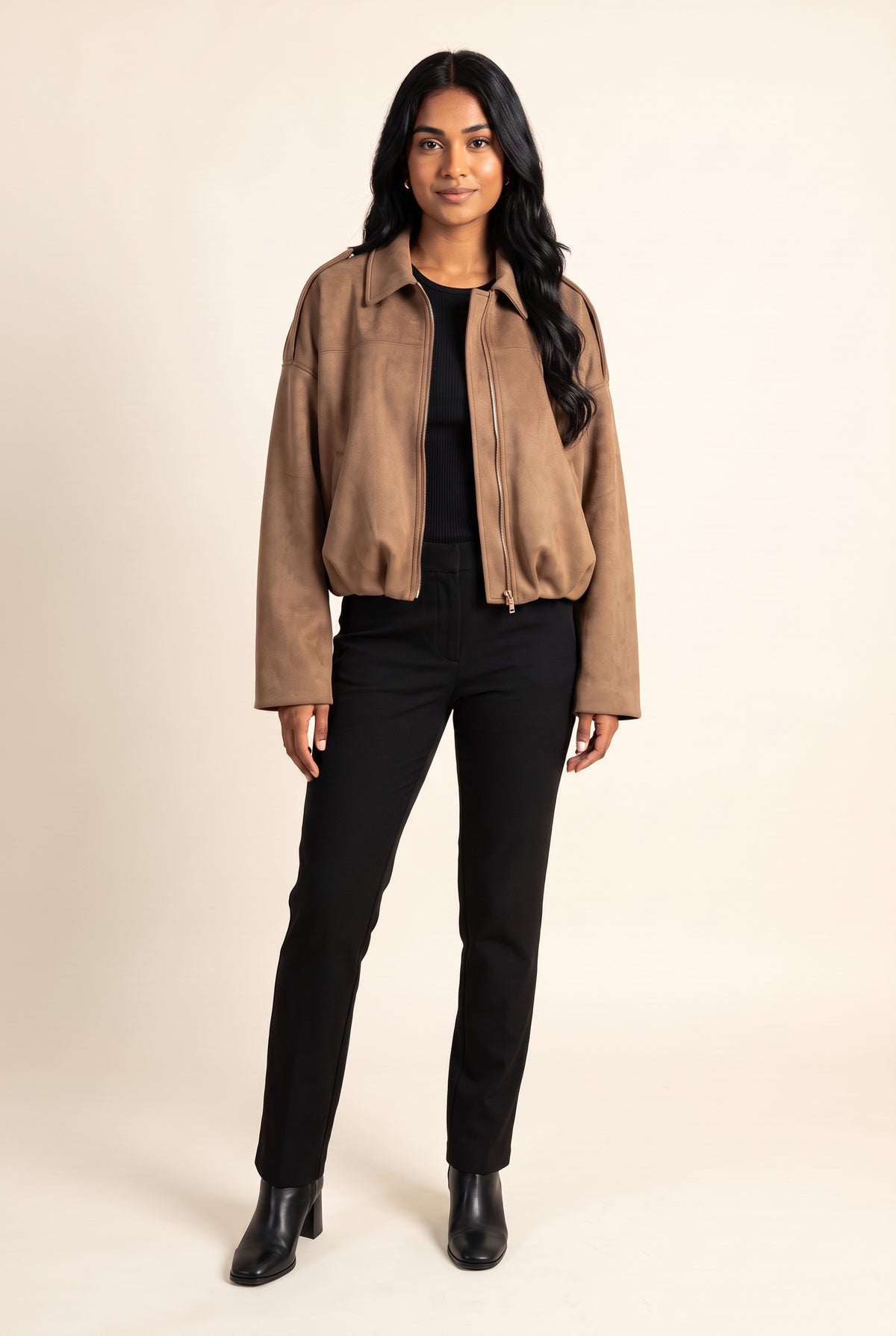 Kovelle faux suede bomber jacket in camel, front view on model
