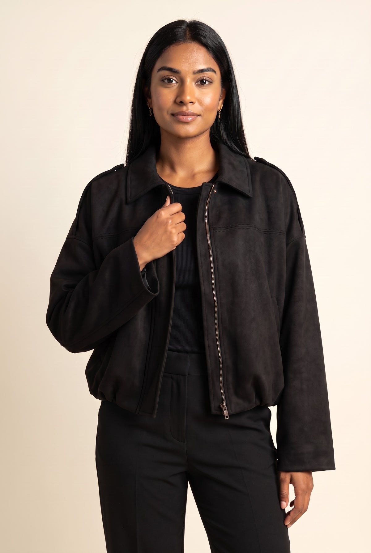 Kovelle faux suede bomber jacket in black, close-up detail on model