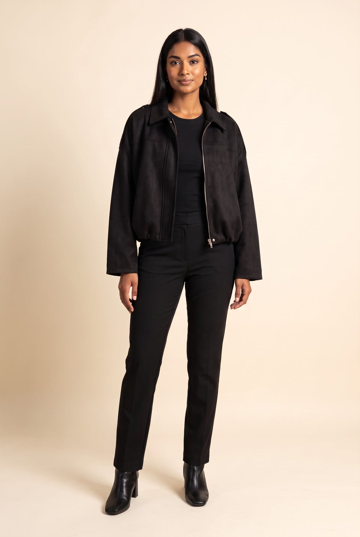 Kovelle faux suede bomber jacket in black, front view on model