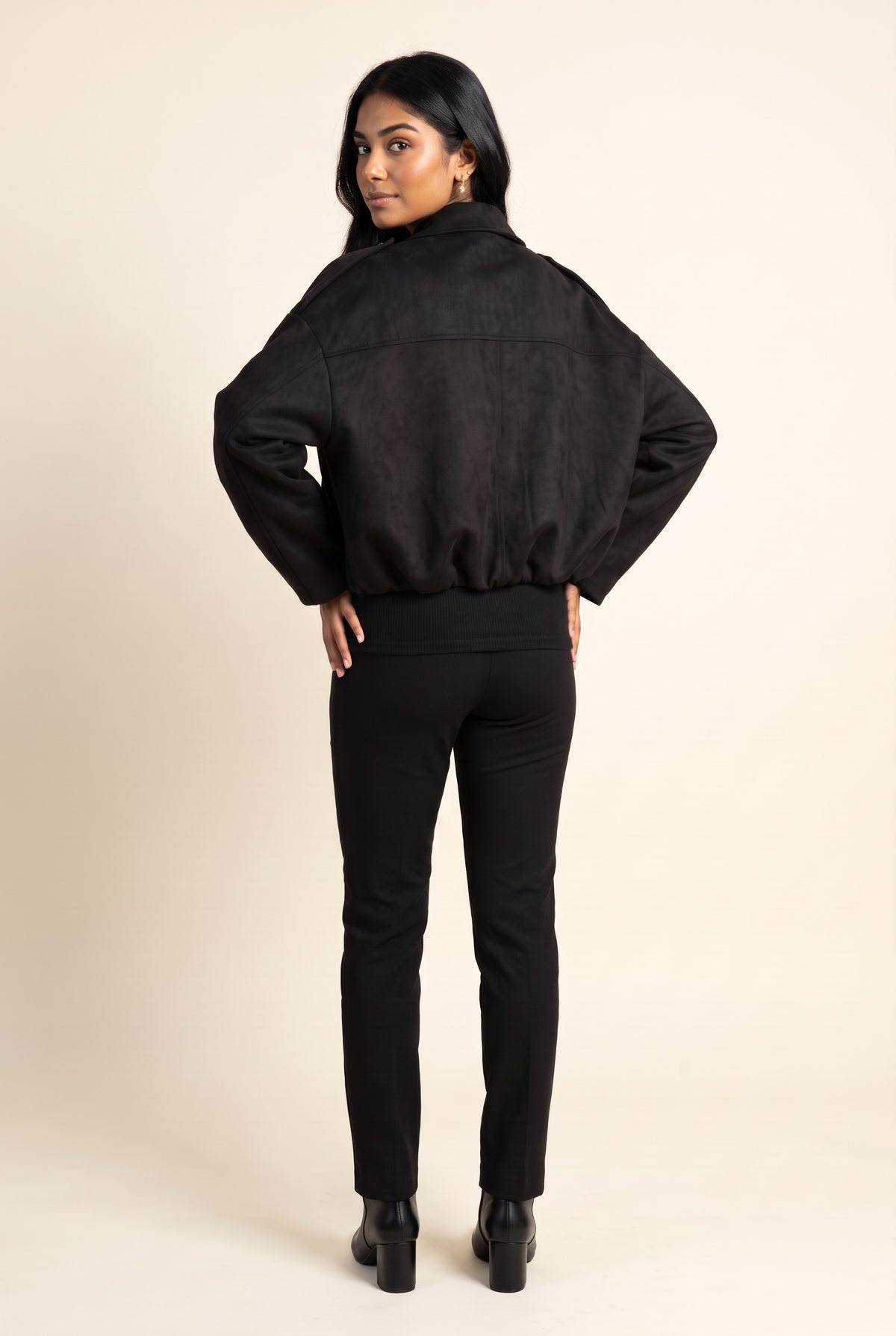 Kovelle faux suede bomber jacket in black, back view on model