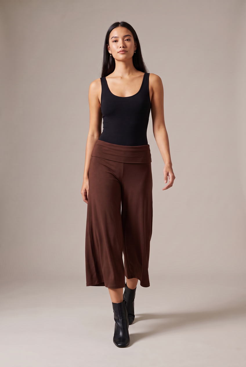Kovelle fold-over waist trousers in chocolate, walking, full length on model