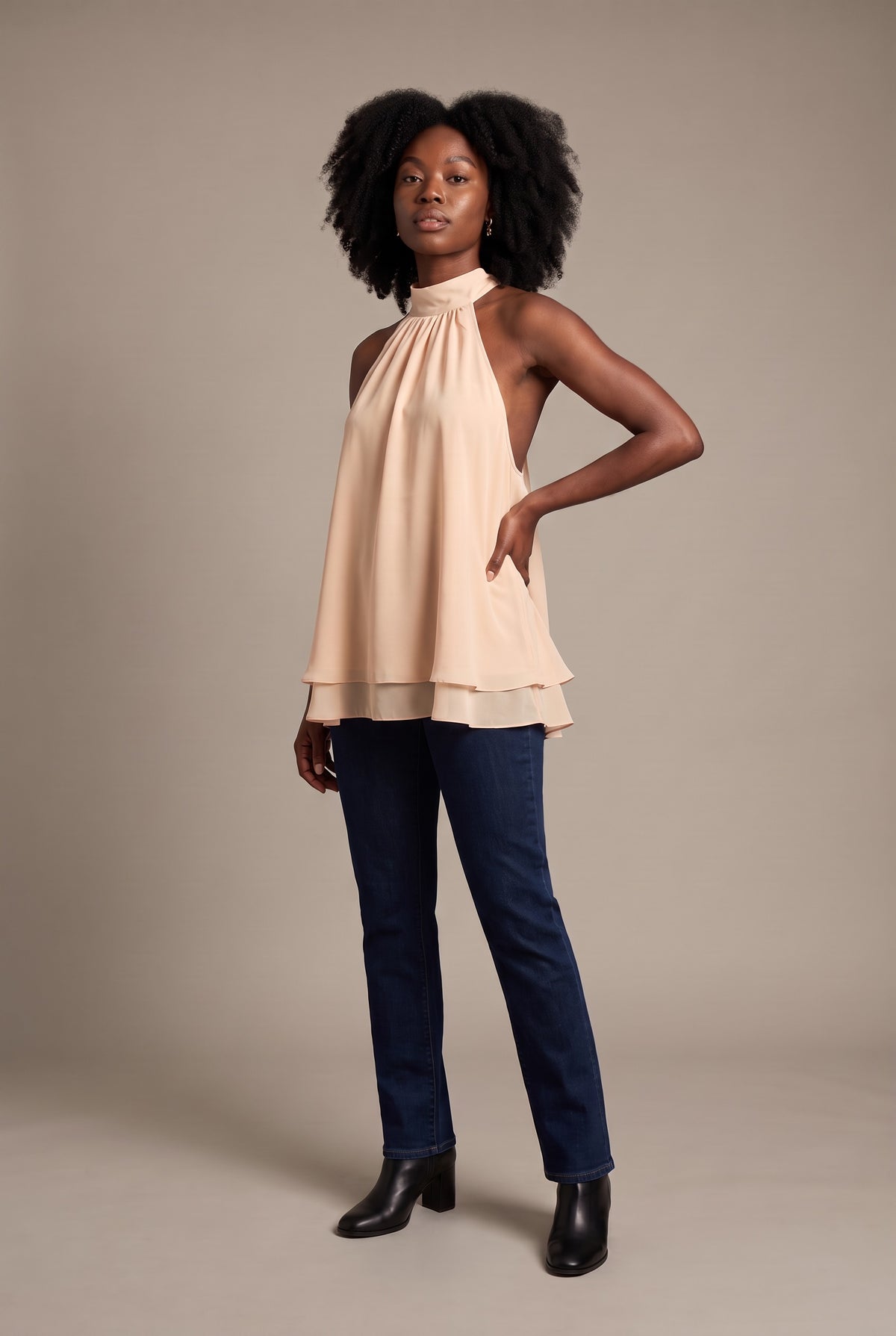 Kovelle halter ruffle hem blouse in apricot, front view on model
