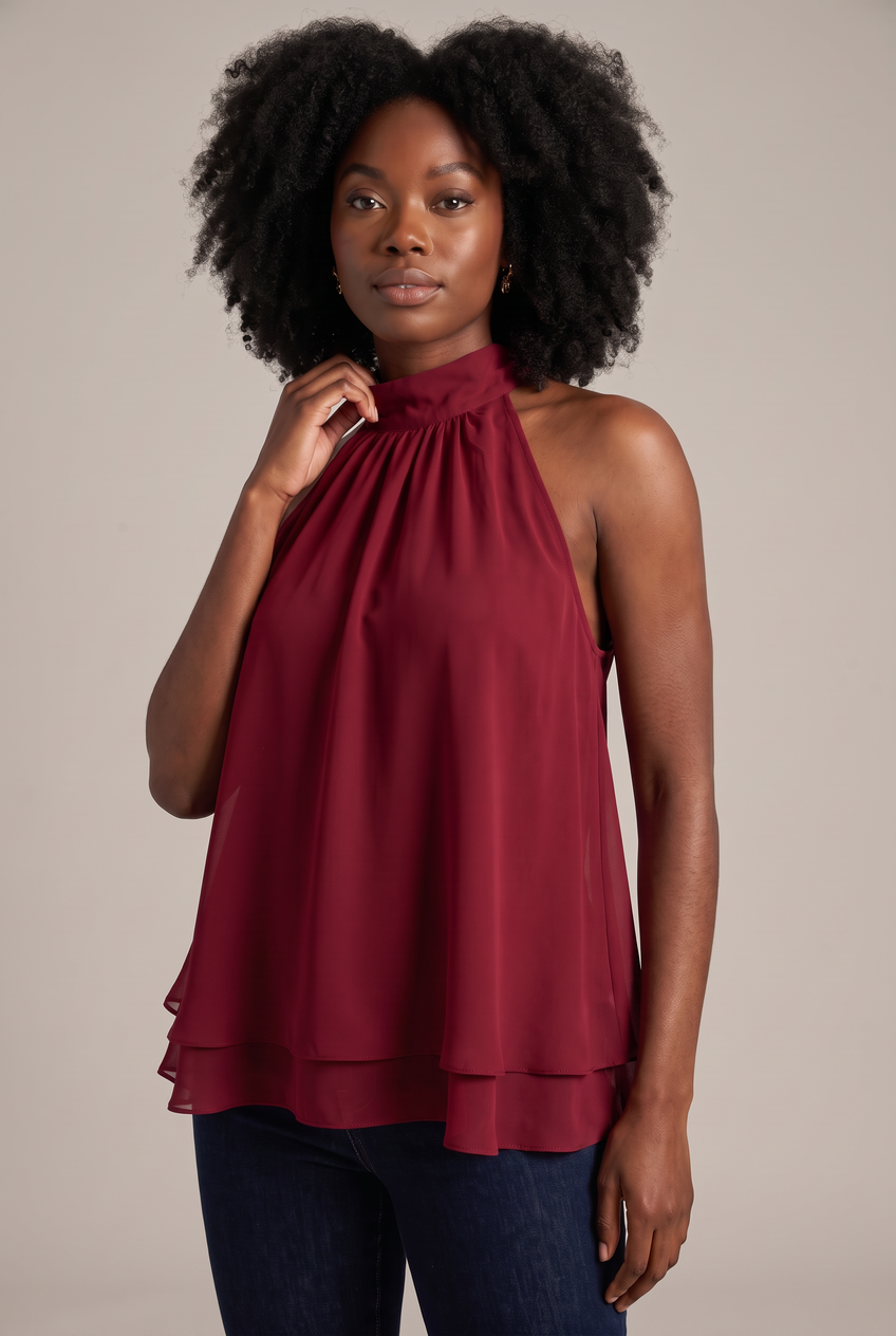 Kovelle halter ruffle hem blouse in red, close-up detail on model
